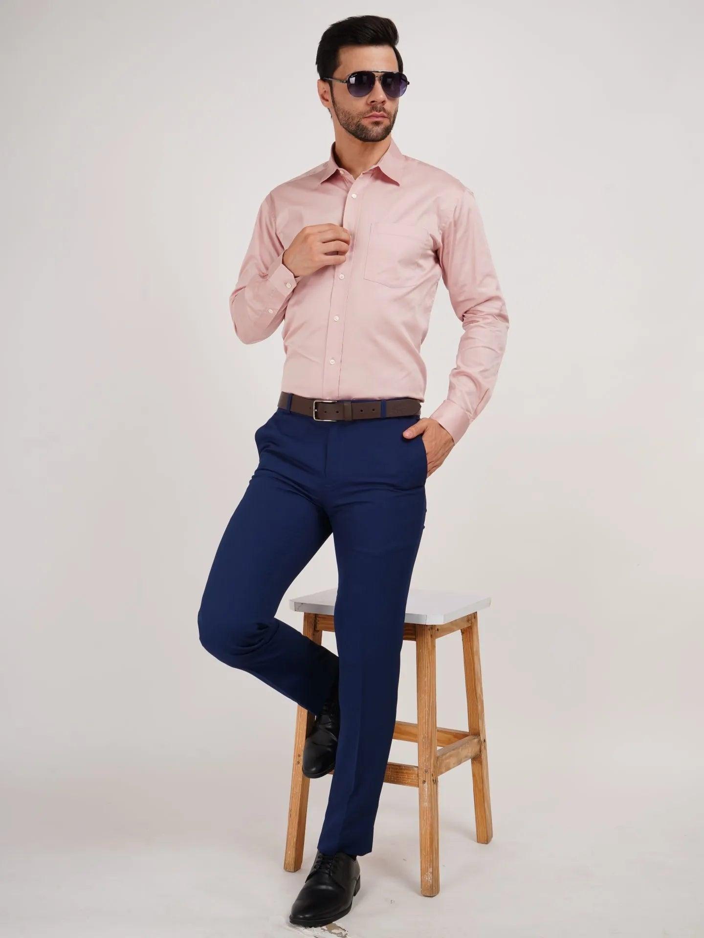Kollarz and Kreazez Pink Cotton Shirt with collar, placket, and pocket can be styled with Navy Blue, Dark Blue, Olive Green, Black and other dark colors. This shirt can be styled Pants, Trousers, Chinos, or with Suits and Ties. Peach Pink shirt with Black Pant, Black formal shoes along with dark shades accessorized with watch will give you a polished look that you desired.