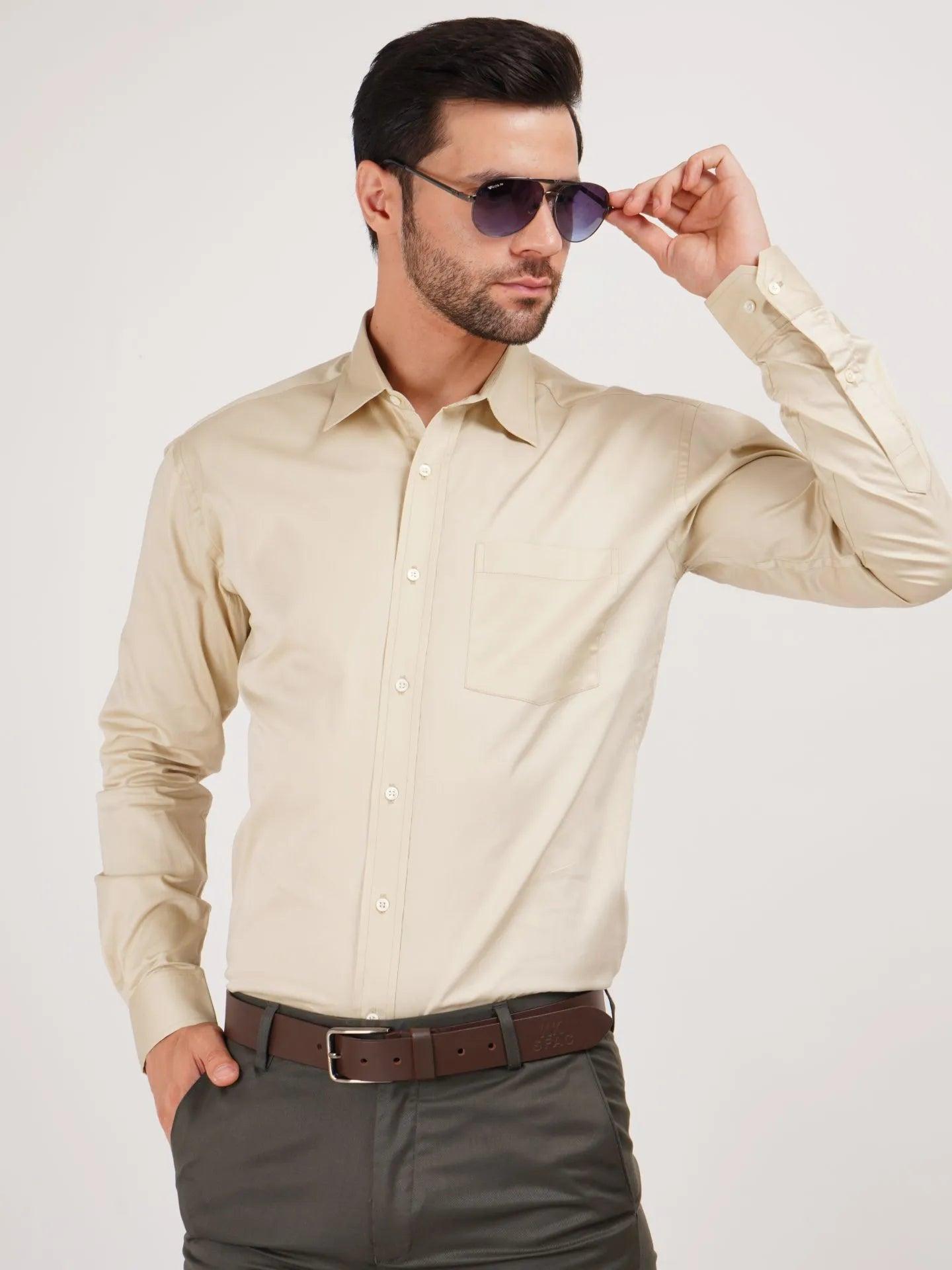 Kollarz and Creases shirt styled with beige pants, black shoes, and blue aviators for that unique look that makes you stand out in any gatheriing.