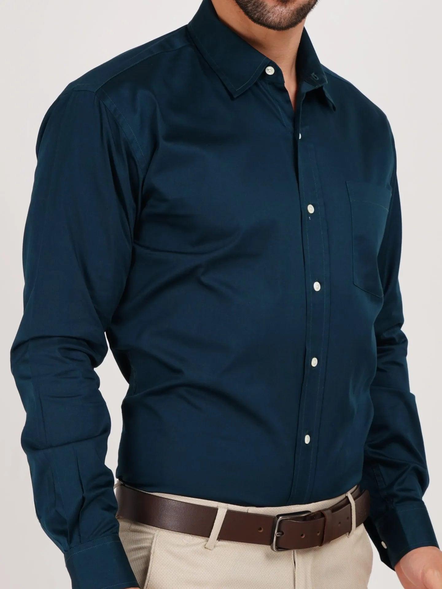Kollarz and Kreazez Dark Teal Blue comes in a unique shades, natural white buttons, placket and a pocket. The shirt is an ultimate choice if you prefer light coloured suits. A light shade multi-colour formal tie will add to your authority whike displaying your welcome for others.