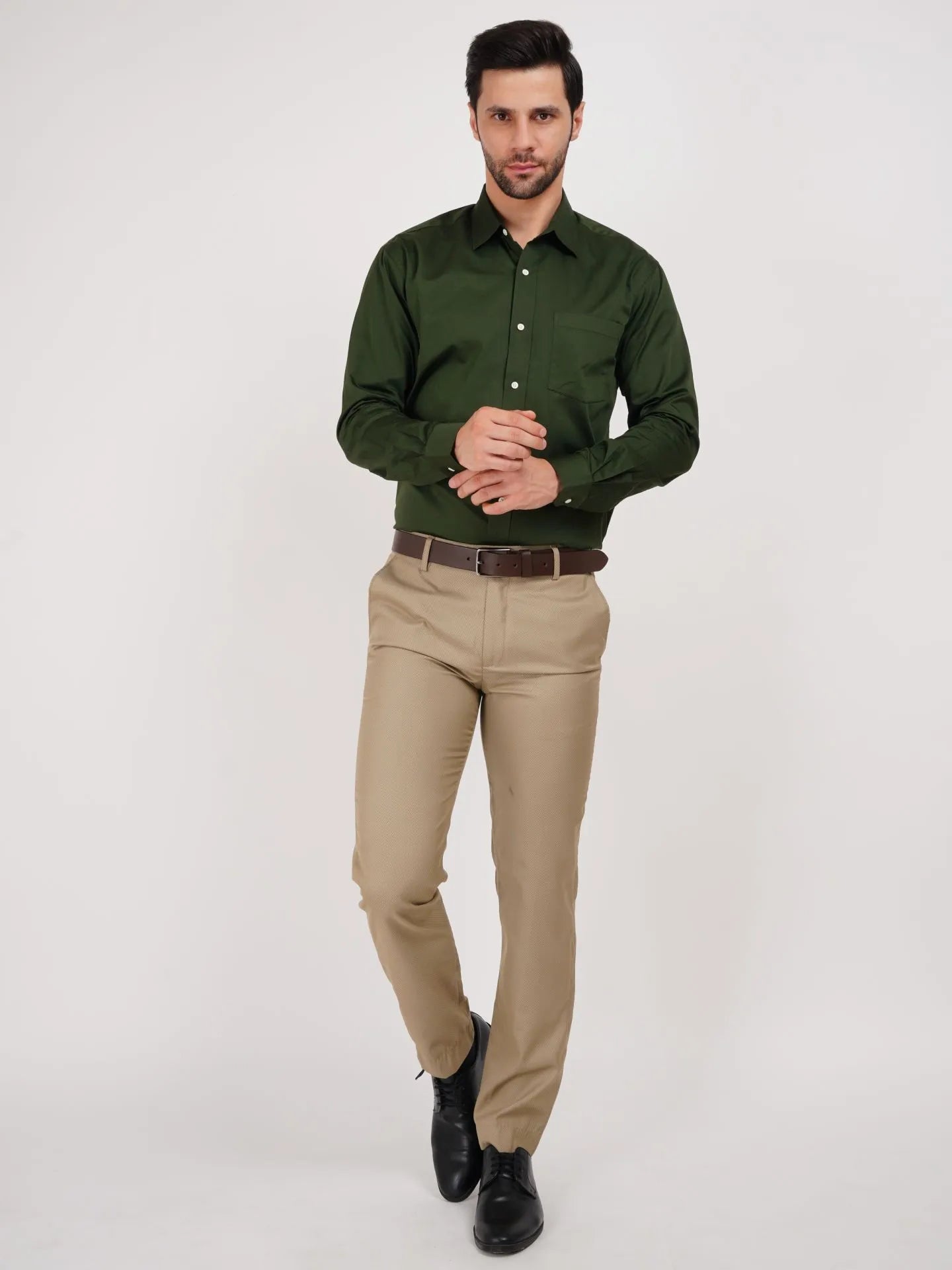 Kollarz and Kreazez Dark Green shirt for men can be styled with formal light shade pants, black shoes and and an Armani watch for the look you aspire.